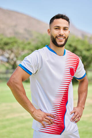 Man wearing sports uniform